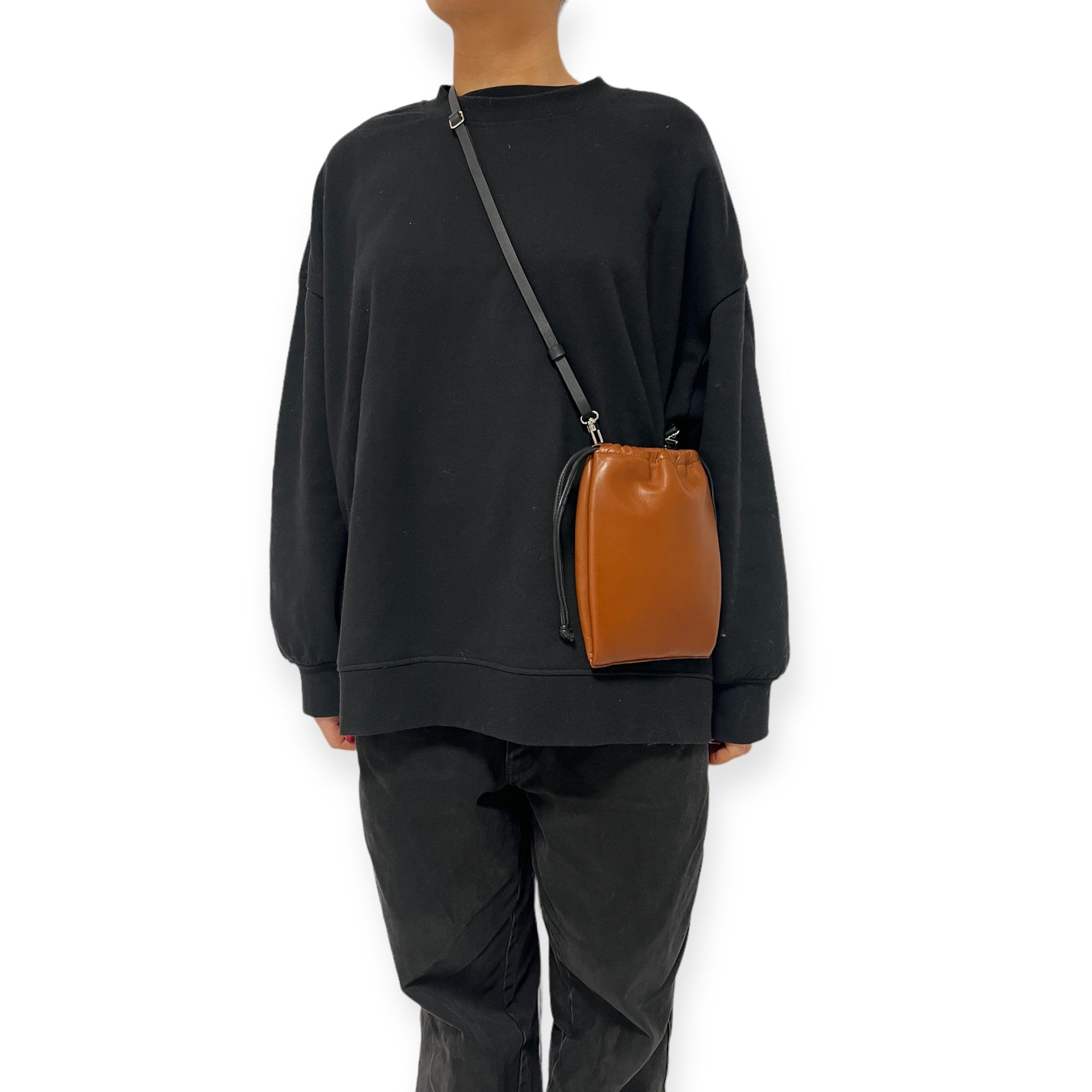 Pochette à lien de serrage - String micro - Cognac et noir