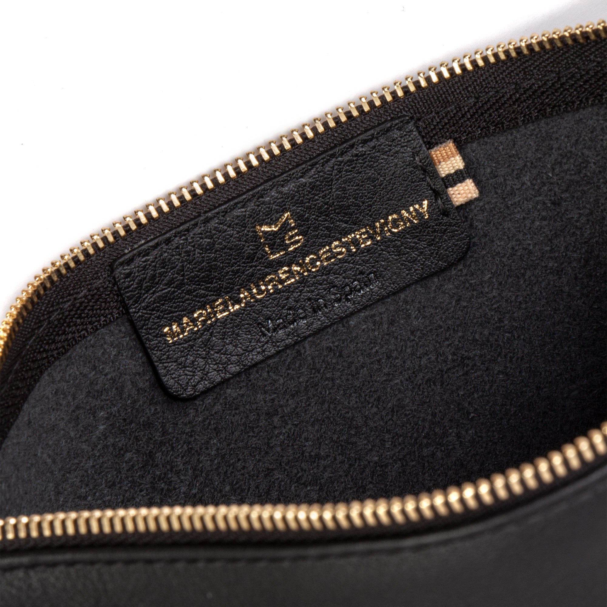MLS_Detail_Emboss_Zip_Gold_Web.jpg
